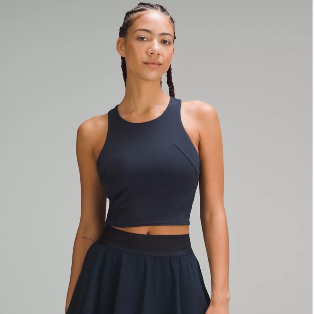 Wunder Train Racerback Tank Top
Medium Support, B/C Cups; size 8; navy